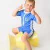 Zoocchini Κοντομάνικο Surf Suit με Στάμπα Dino/Med Blue